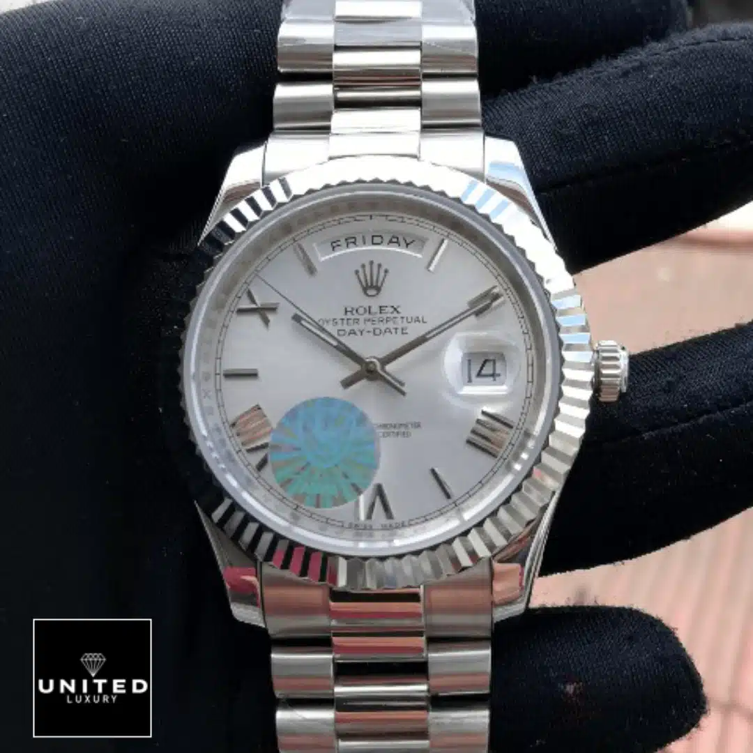 Rolex Day-Date 40 228239 EW Stainless Steel White Gold Dial Oyster Replica 1 Day-Date 228239 Roman Fluted Bezel White Dial Replica on the hand