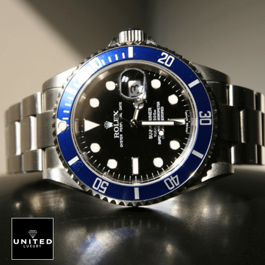 Rolex Submariner Date 16610 Black Dial Oyster Replica 4 Rolex Submariner Date 16610 Black Dial Oyster Replica on the table
