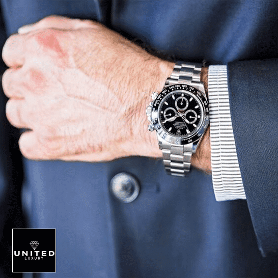 Daytona 116520 Black Dial Replica 4 Rolex Daytona 116500ln-0002 Stainless Steel Oyster Replica on his arm