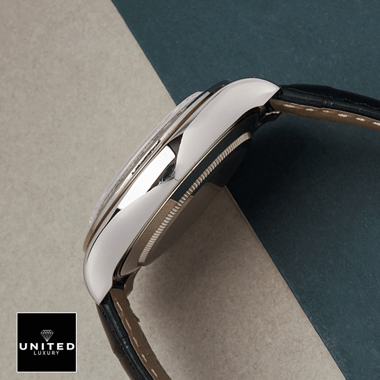 Rolex Daytona 116519 White Roman Dial Replica 5 Rolex Daytona 116519 Stainless Steel Case Replica on the table