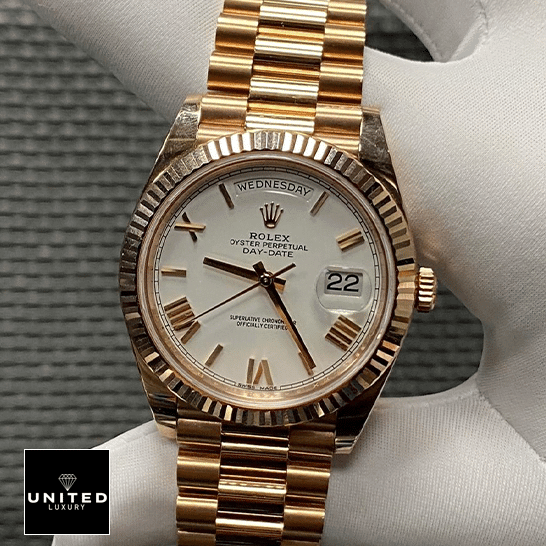 Rolex Day-Date 228235 KW Rose Gold White Dial Replica 4 Rolex Day-Date 228235 Roman Gold Oyster Bracelet Replica on the hand