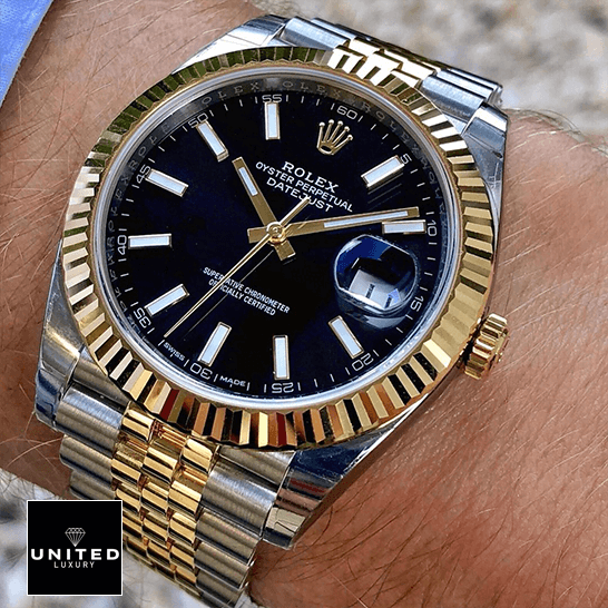 Rolex Datejust 126333 Yellow Gold & Steel Black Dial Jubilee Replica 2 Rolex Datejust 126333 Black Dial Yellow Gold Replica on the man wrist