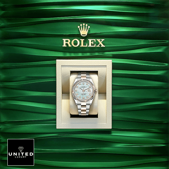 Rolex Datejust 126331-0013 Mother Of Pearl Dial Replica 3 Rolex Datejust 41 126331-0013 Mother Of Pearl Replica in the Box and Green wave background