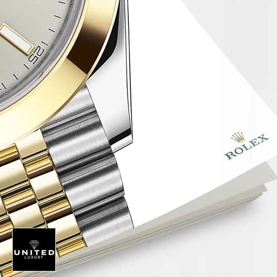 Yellow Gold Datejust Replica 6 Rolex Datejust 41 126303-0002 Replica Silver Dial Gold Bezel Two tone Bracelet and on the Rolex notebook