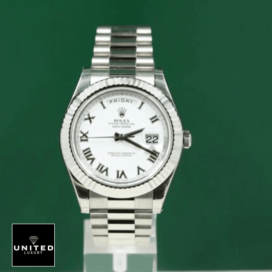 Rolex Day-Date Roman White Dial Replica 4 Rolex Day-Date II 218239 White Dial Replica & Green background