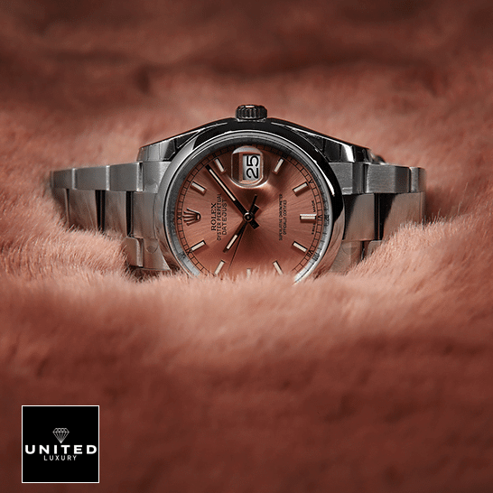Rolex Datejust 116200-0079 Oyster Perpetual Replica 1 Rolex Datejust 116200 Steel Pink Dial Replica above the pink feathers