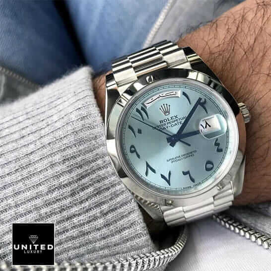 Rolex Day-Date Arabic Dial 228206 Replica 2 Rolex DayDate 40 228206 Replica under gray sweater