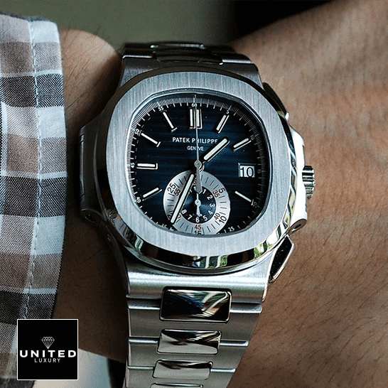 Patek Nautilus Blue Silver Replica 2 Patek Philippe 59801A-001 Nautilus Blue Dial Steel Replica on the man wrist