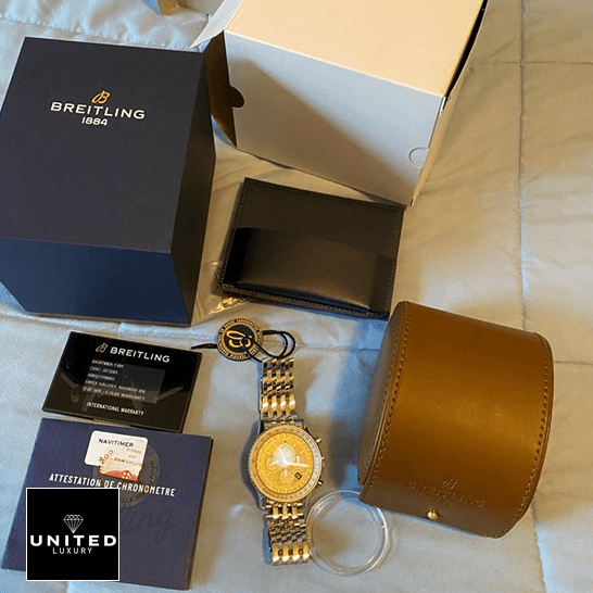 Breitling Navitimer B01 Black Replica 3 Breitling Navitimer AB0127211B1A1 Replica next to warranty card