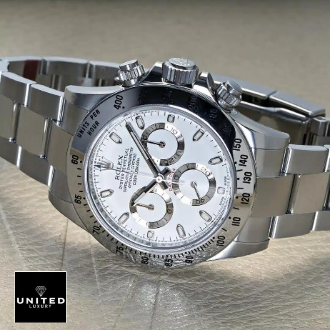 Rolex Daytona White Dial 116520 Replica 3 Rolex Daytona White Dial 116520 S.Steel Oyster Bracelet Replica on the table