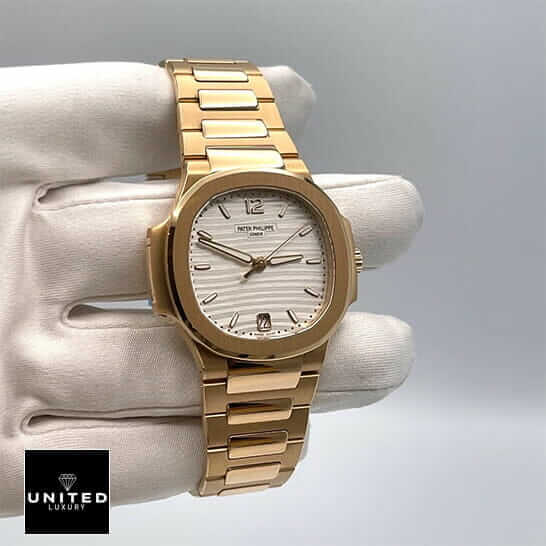 Patek Philippe Rose White Replica 2 Patek Philippe Rose Gold White Dial Replica on the white glove hand white background