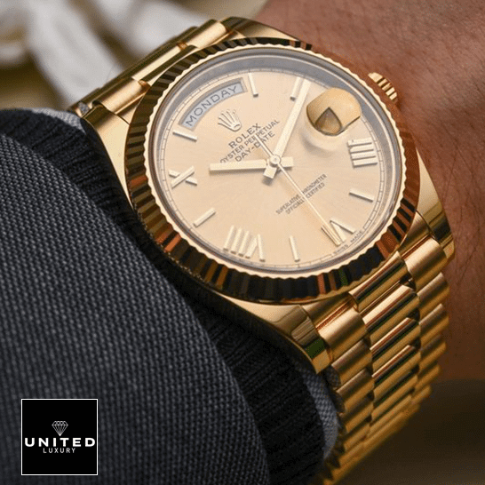 Rolex Day-Date II 228238-0007 KW Yellow Gold Champagne Dial Replica 3 Rolex Day-Date II 228238-0007 Yellow Gold Romen Numerial Dial Replica on is arm