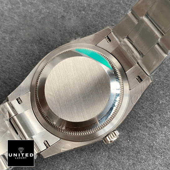 Rolex Perpetual 116200 Replica 3 Rolex Datejust 36 Perpetual 116200 Stainless Steel Case Replica on the table