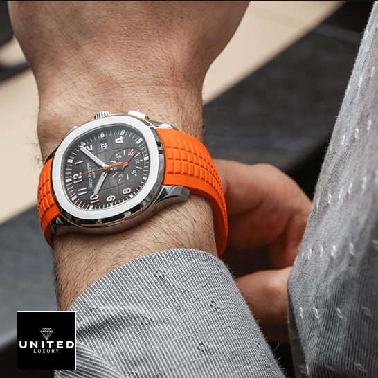 Patek Philippe Chronograph Replica 8 Patek Philippe Aquanaut Orange 5968A-001 Black Dial Replica on the man wrist