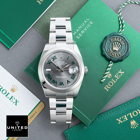 Wimbledon Rolex Replica Watch 5 Rolex Datejust Wimbledon 126300-0013 Oyster Replica & Guarantee Card on the table