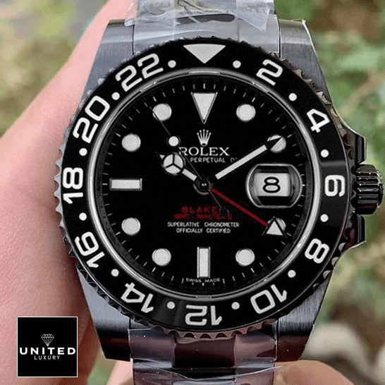 Rolex Blaken GMT-Master II Single Red Replica 1 Rolex Blaken GMT-Master II Black Dial ceramic stick hour markers Replica in their hands
